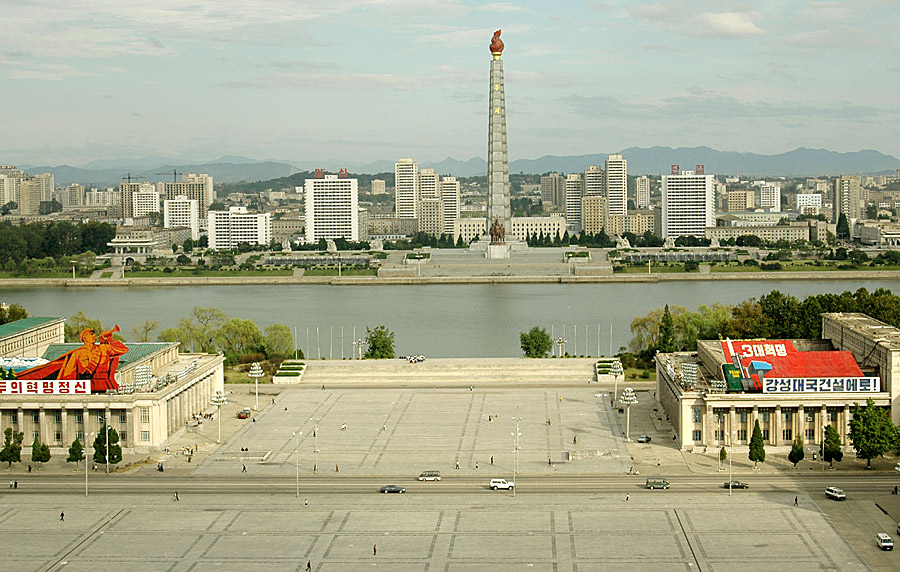 Juche Tower over Taedong River in Pyongyang  by Ron Gluckman in North Korea